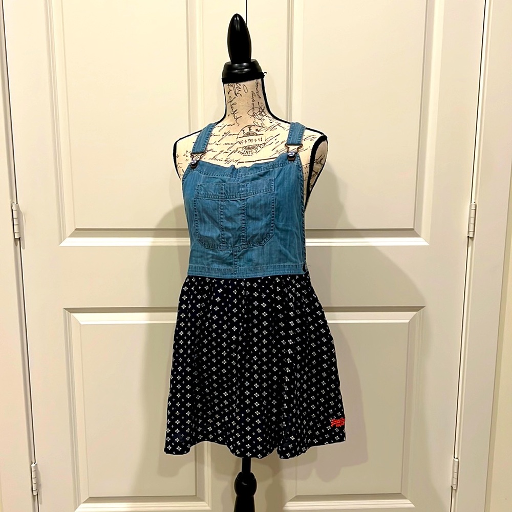 NWT! Superdry denim overall dress with super cool button design.
